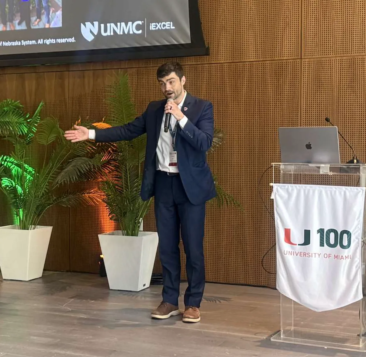 Michael Hollins presenting for iEXCEL at the University of Miami Bascom Palmer Eye Institute Digital Eye-Con in April 2026