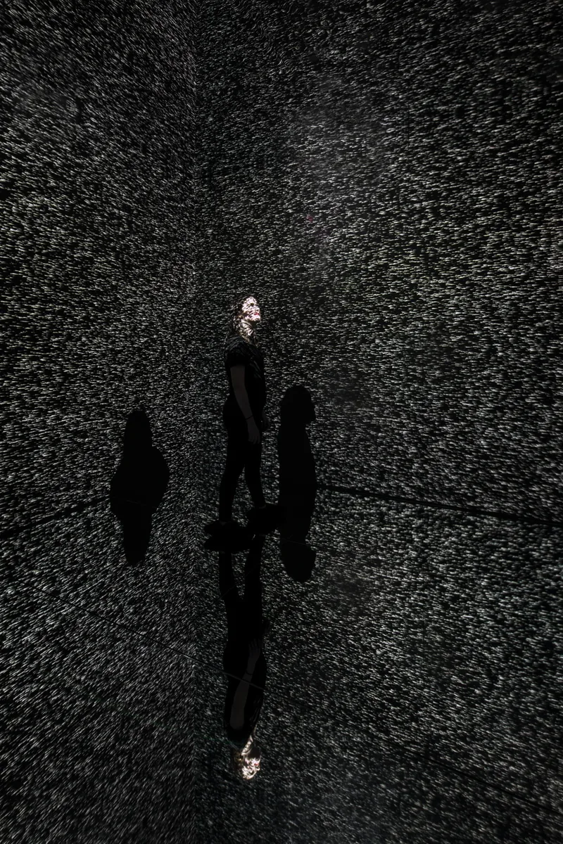 Visitor inside Refik Anadol Infinity Room at KANEKO in 2018