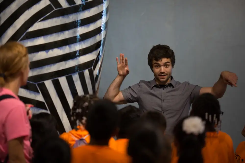 Michael Hollins teaching students during Passion and Obsession at KANEKO