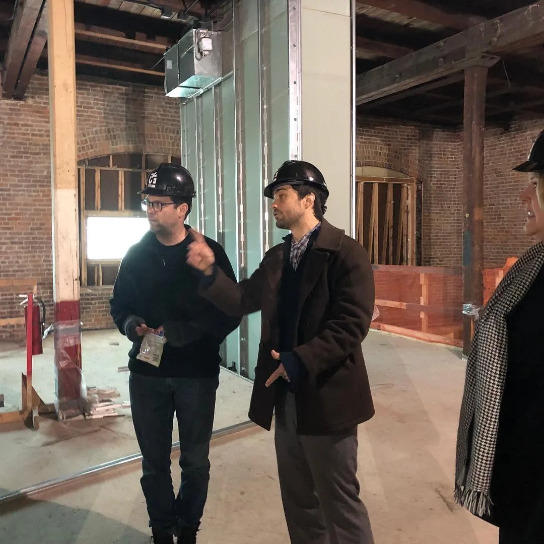 Michael Hollins discussing the evolving Hoff Center facility during construction